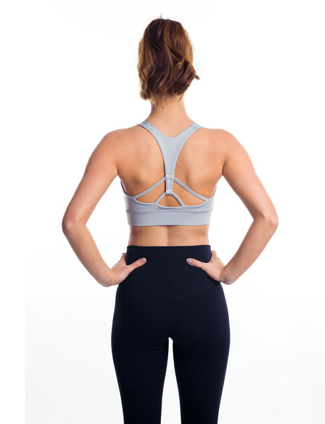 Grey strappy sports bra back view on model